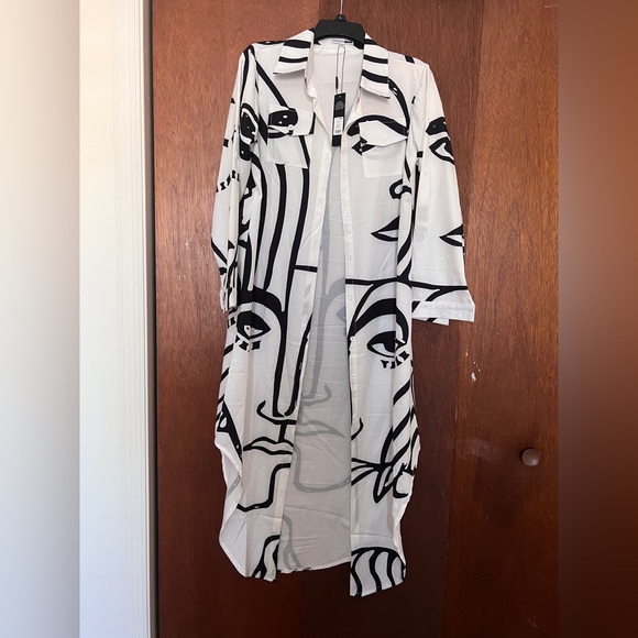 Fashion Nova Dresses & Skirts - Fashion Nova White Button-Front Shirt Dress with Black Abstract Face Print
